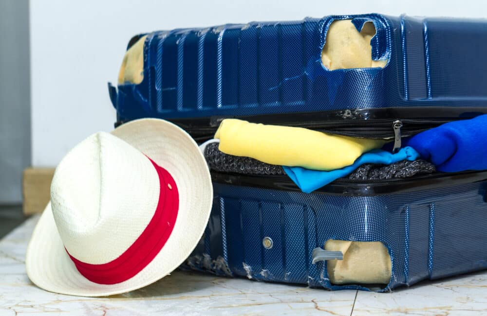 Why do travellers wrap their luggage in plastic, and is it worth it?