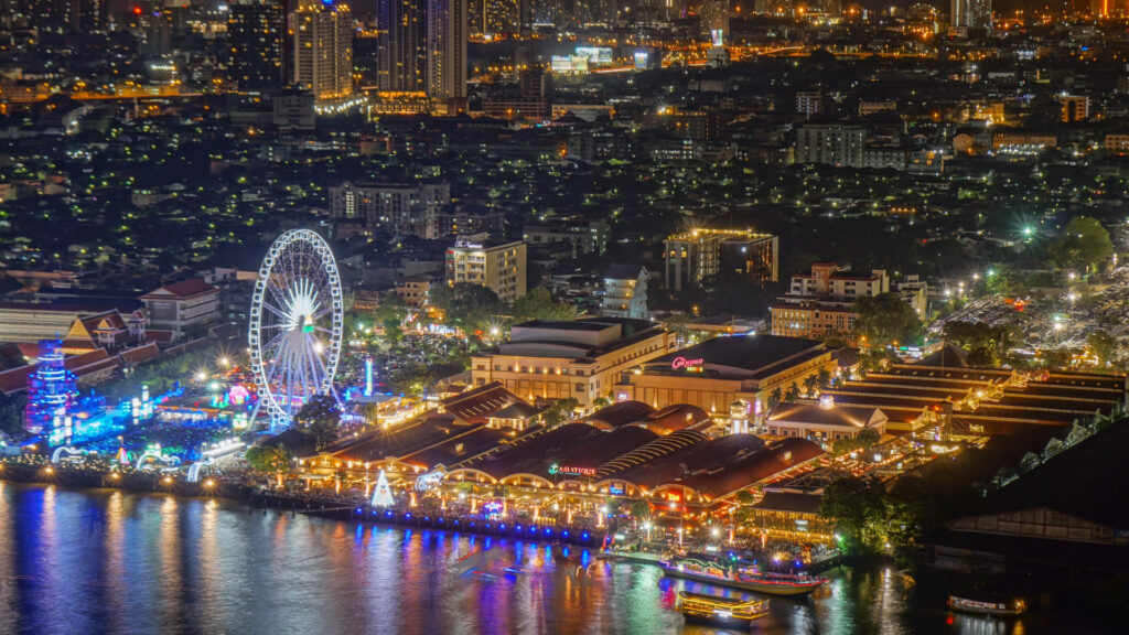 a night market meets shopping mall on the riverbank.