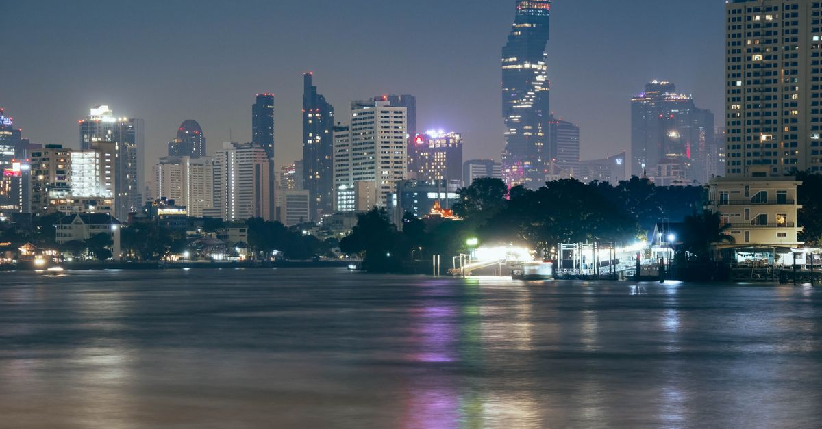 Evening dinner on the Chao Phraya riverside during the final leg of a one-day Bangkok stopover